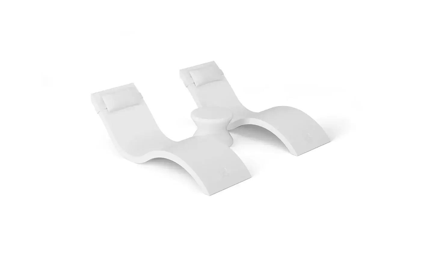 Designed for tanning ledges, baja shelves, or sun shelves with water depths up to 9 inches, this set includes two Signature In-Pool Chaise Loungers, two plush Headrest Pillows, and a versatile Side Table.