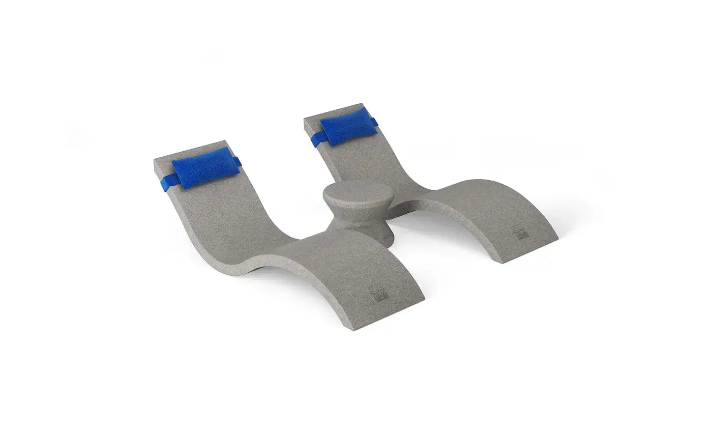 Designed for tanning ledges, baja shelves, or sun shelves with water depths up to 9 inches, this set includes two Signature In-Pool Chaise Loungers, two plush Headrest Pillows, and a versatile Side Table.