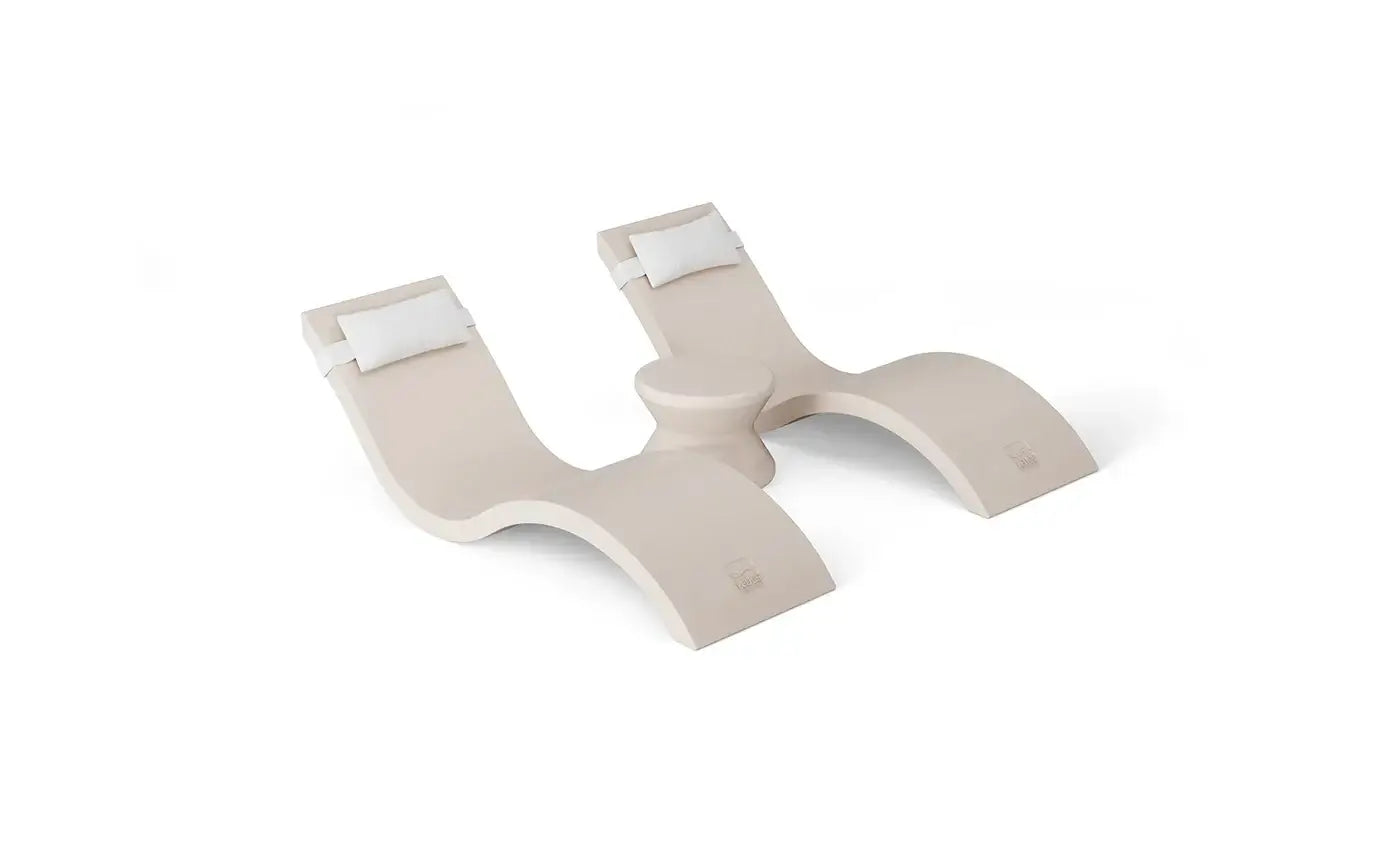 Designed for tanning ledges, baja shelves, or sun shelves with water depths up to 9 inches, this set includes two Signature In-Pool Chaise Loungers, two plush Headrest Pillows, and a versatile Side Table.