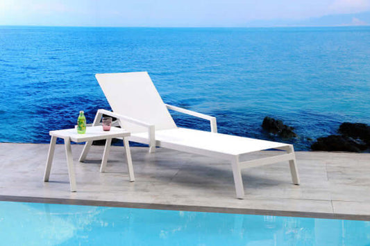 Panama Jack sling chaise lounger made with strong powder-coated finish resistant to corroding and scratching