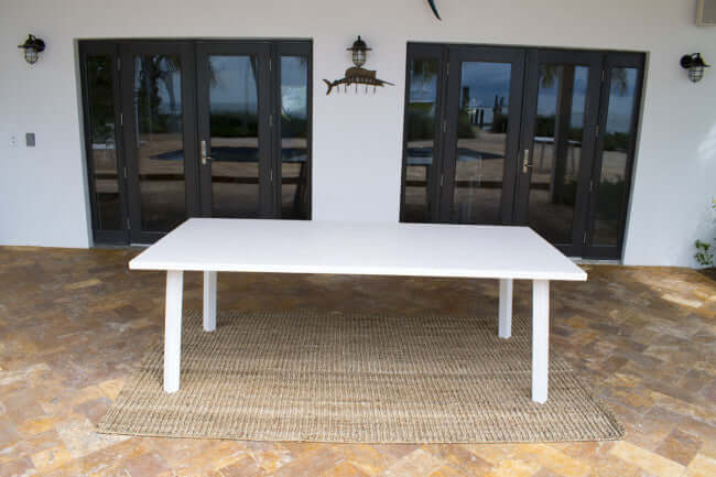 Panama Jack rectangular outdoor dining table made with extruded Aluminum frame and off-white sling