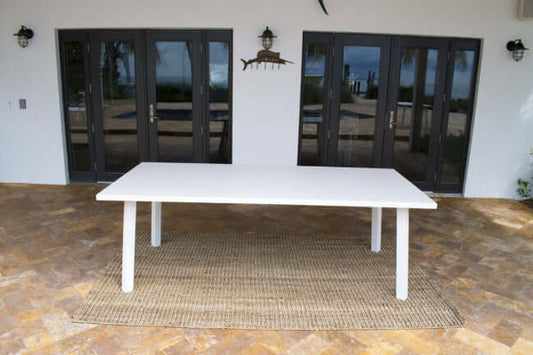 Panama Jack rectangular outdoor dining table made with extruded Aluminum frame and off-white sling