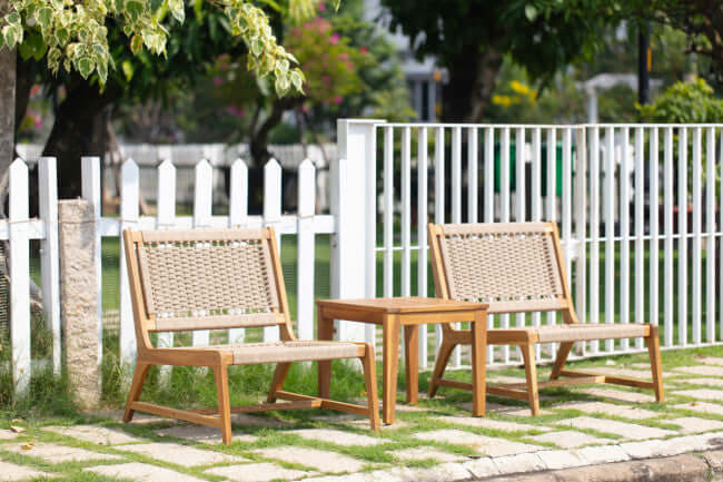 Panama Jack 3-piece Adirondack chair set made with solid Acacia wood construction and fast drying tan rope