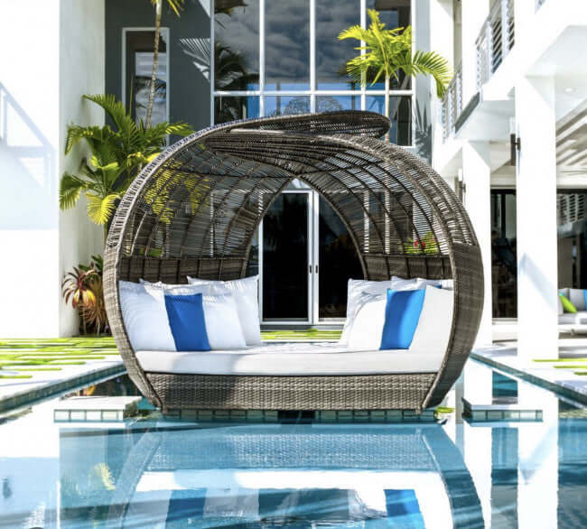Panama Jack outdoor large scale daybed crafted with commercial grade extruded aluminum framing and woven with HDPE synthetic fiber
