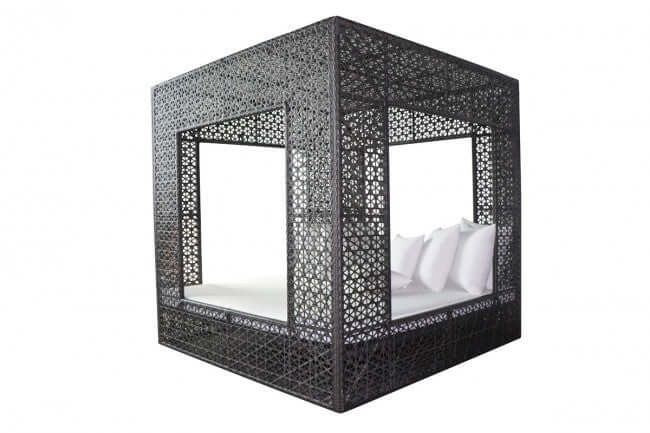 Panama Jack cube-shaped outdoor daybed built with weather-resistant materials to accommodate up to four people