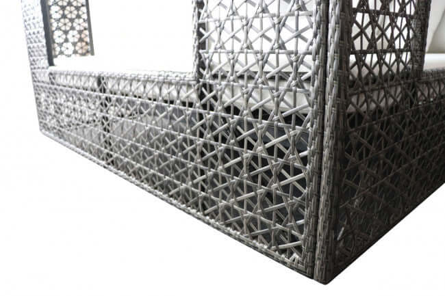 Panama Jack cube-shaped outdoor daybed built with weather-resistant materials to accommodate up to four people