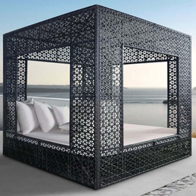 Panama Jack cube-shaped outdoor daybed built with weather-resistant materials to accommodate up to four people