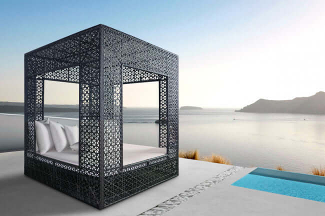 Panama Jack cube-shaped outdoor daybed built with weather-resistant materials to accommodate up to four people