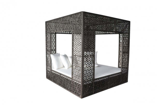 Panama Jack cube-shaped outdoor daybed built with weather-resistant materials to accommodate up to four people