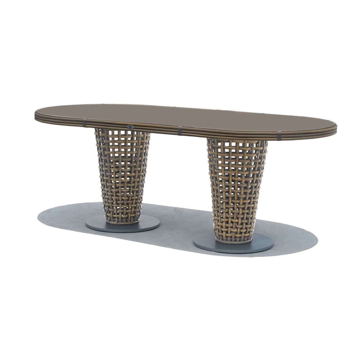 Oval table with wicker base on a white background