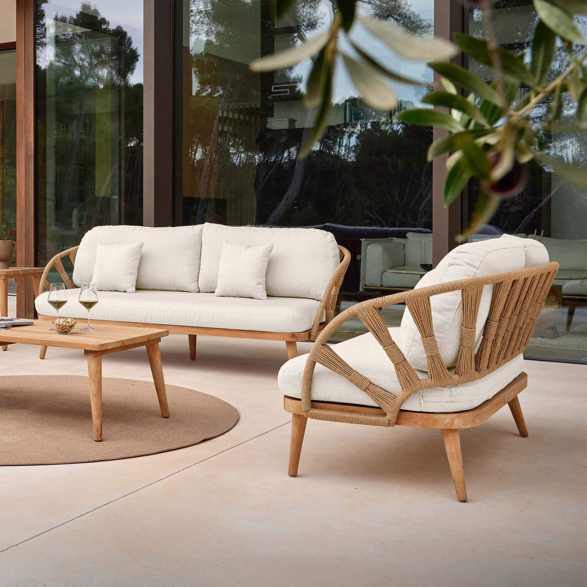 Outdoor sofa made from teak wood and polystrand rami natural rope