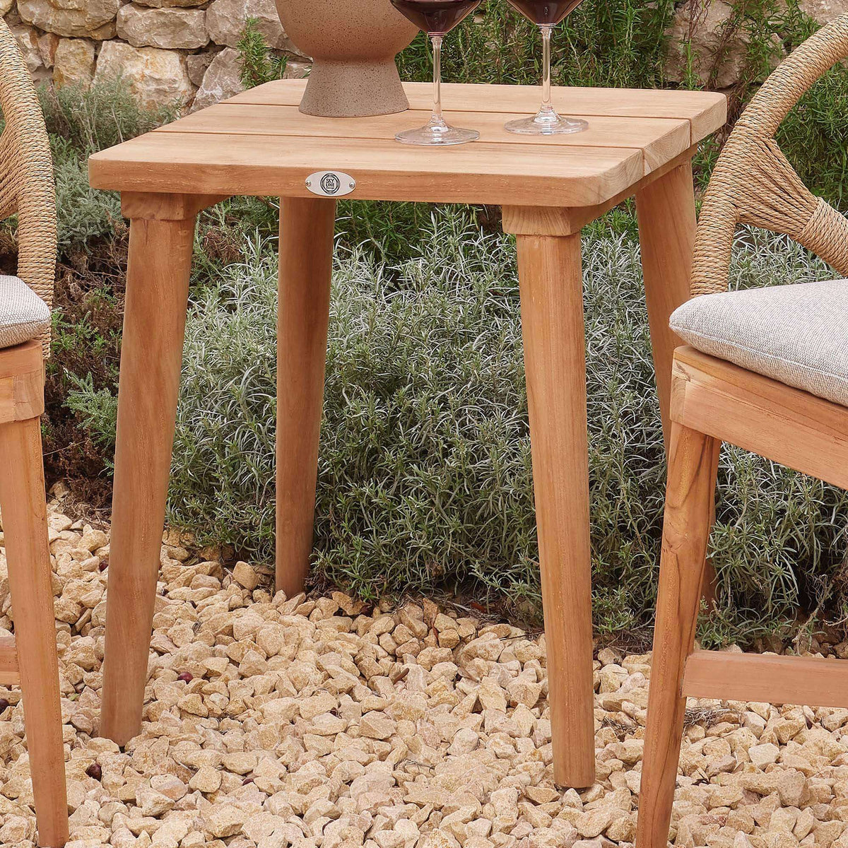 Outdoor side table made from teak wood