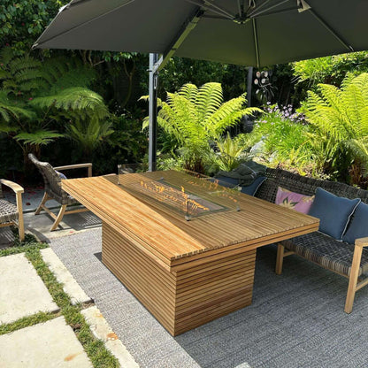 Anderson Teak Louvre Rectangular Fireplace Table in Patio Setting Around Fire Pit