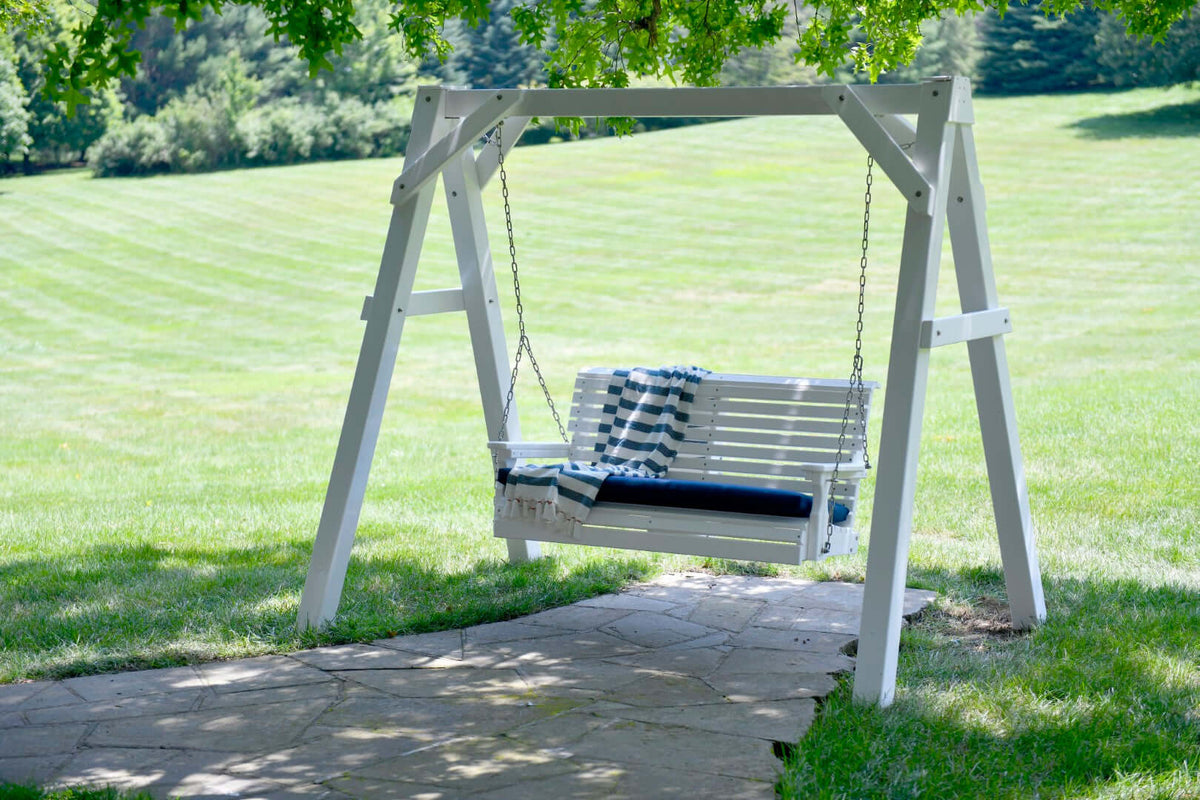 LuxCraft 4' Plain Porch Swing in White positioned for front-porch hanging — all-weather outdoor build