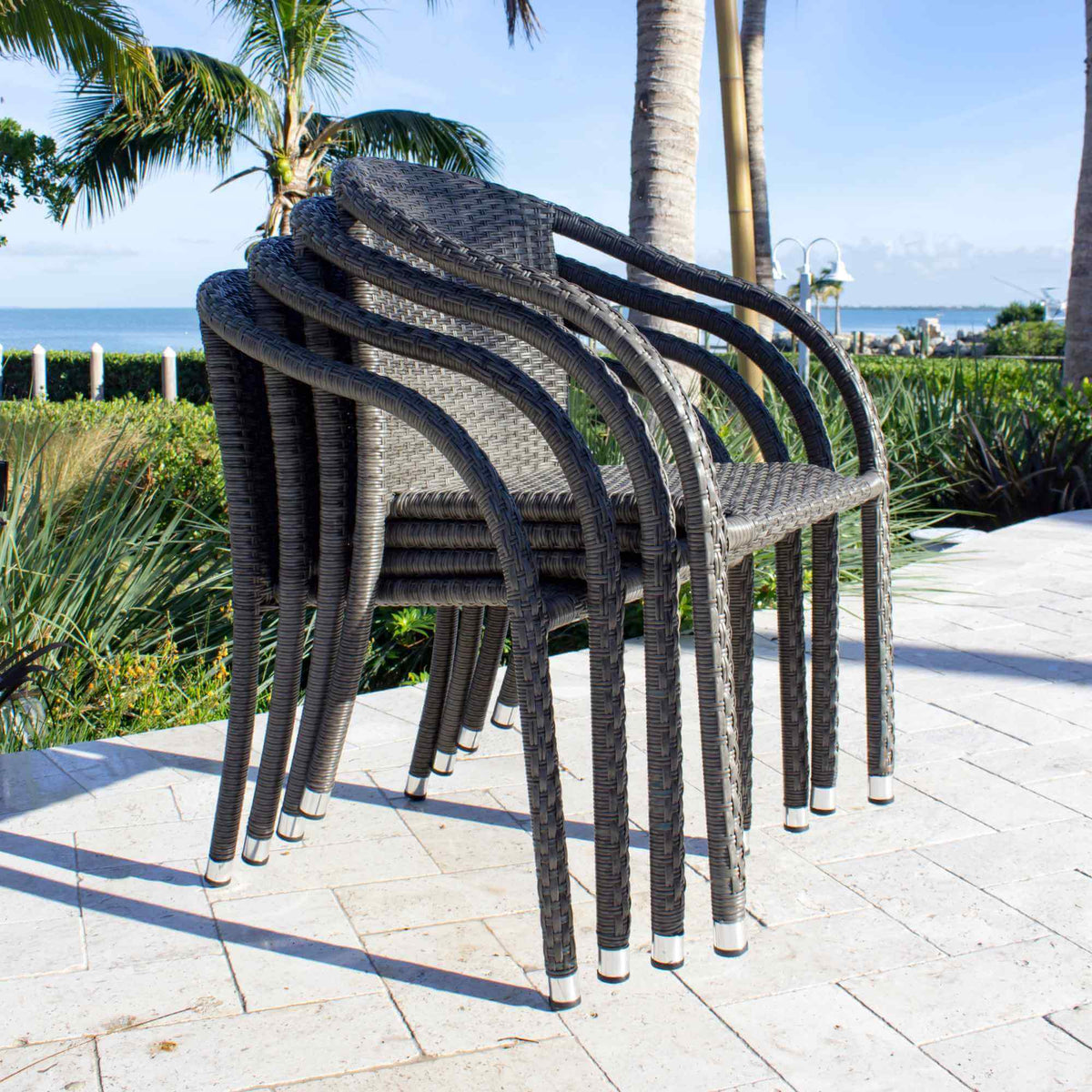 Outdoor stackable chairs made with HDPE synthetic wicker