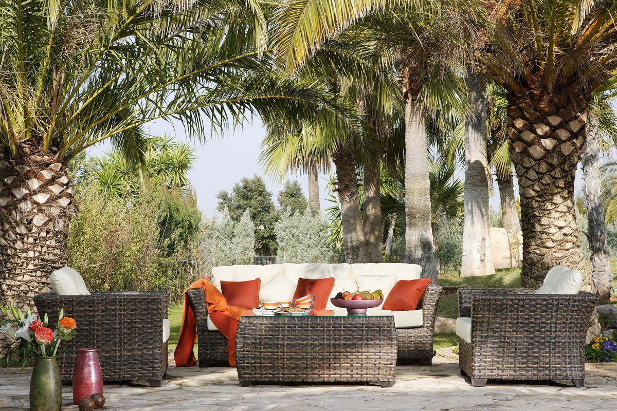 Sleek outdoor sofa with cushions made from commercial quality thick wicker weave pattern
