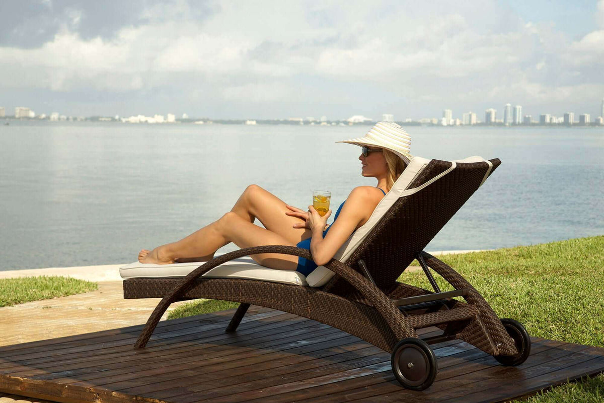 Chaise lounge chair made from aluminum frame woven with Rehau Java Brown fiber with cushion