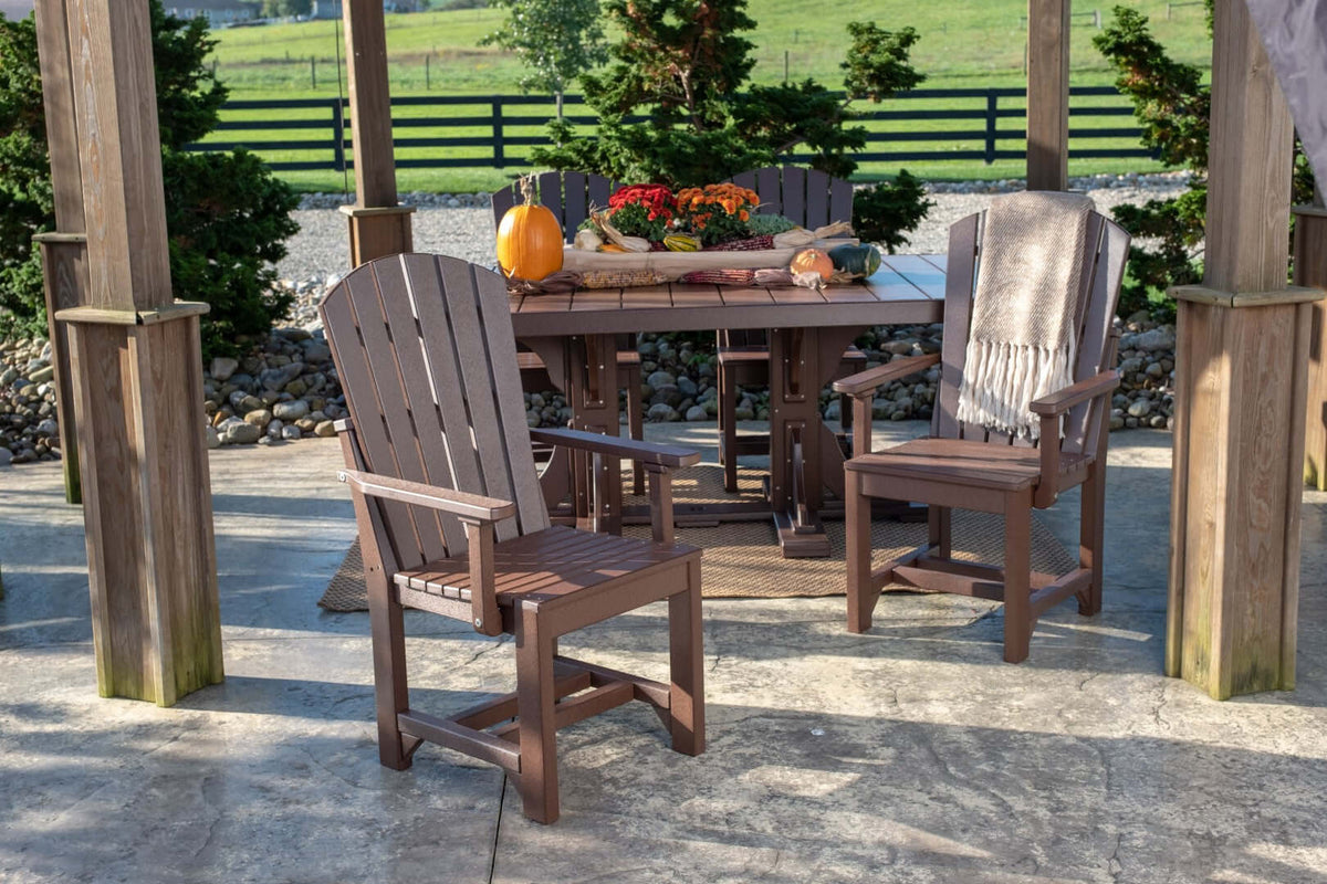 LuxCraft Adirondack Dining Arm Chair in Chestnut Brown paired for patio lounging — weather-resistant design