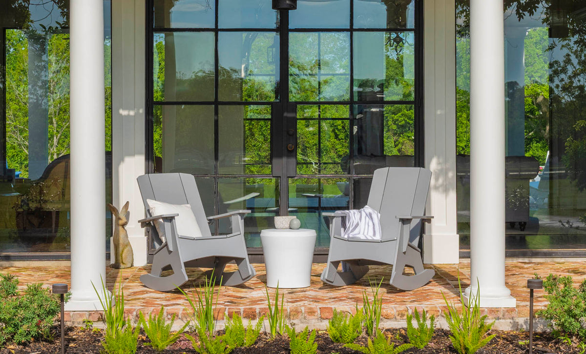 Affinity Side Table used on a porch between two rocking chairs