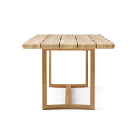 Teak outdoor dining table with natural finish