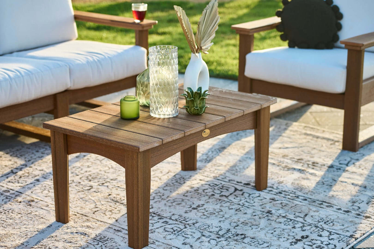 LuxCraft Outdoor Island Coffee Table in Antique Mahogany paired for porch and deck use — weather-resistant design