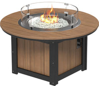 LuxCraft round gas propane outdoor fire pit table with push-button ignition system and tempered glass wind guard