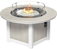 LuxCraft round gas propane outdoor fire pit table with push-button ignition system and tempered glass wind guard