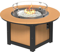 LuxCraft round gas propane outdoor fire pit table with push-button ignition system and tempered glass wind guard