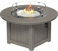 LuxCraft round gas propane outdoor fire pit table with push-button ignition system and tempered glass wind guard