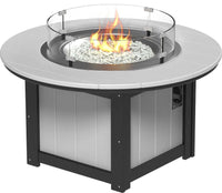 LuxCraft round gas propane outdoor fire pit table with push-button ignition system and tempered glass wind guard