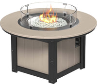 LuxCraft round gas propane outdoor fire pit table with push-button ignition system and tempered glass wind guard