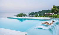 Indulge in unparalleled poolside luxury with the Ledge Lounger Signature Chaise Deep