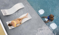 Ledge Lounger Signature Chaise, crafted for supreme comfort on your pool’s sun shelf, tanning ledge, or any surface submerged in 0-9 inches (0-22 cm) of water.