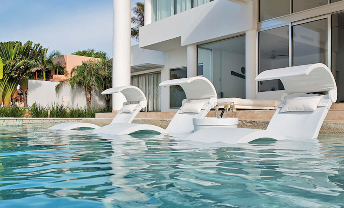 Indulge in unparalleled poolside luxury with the Ledge Lounger Signature Chaise Deep