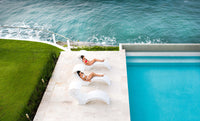 Indulge in unparalleled poolside luxury with the Ledge Lounger Signature Chaise Deep
