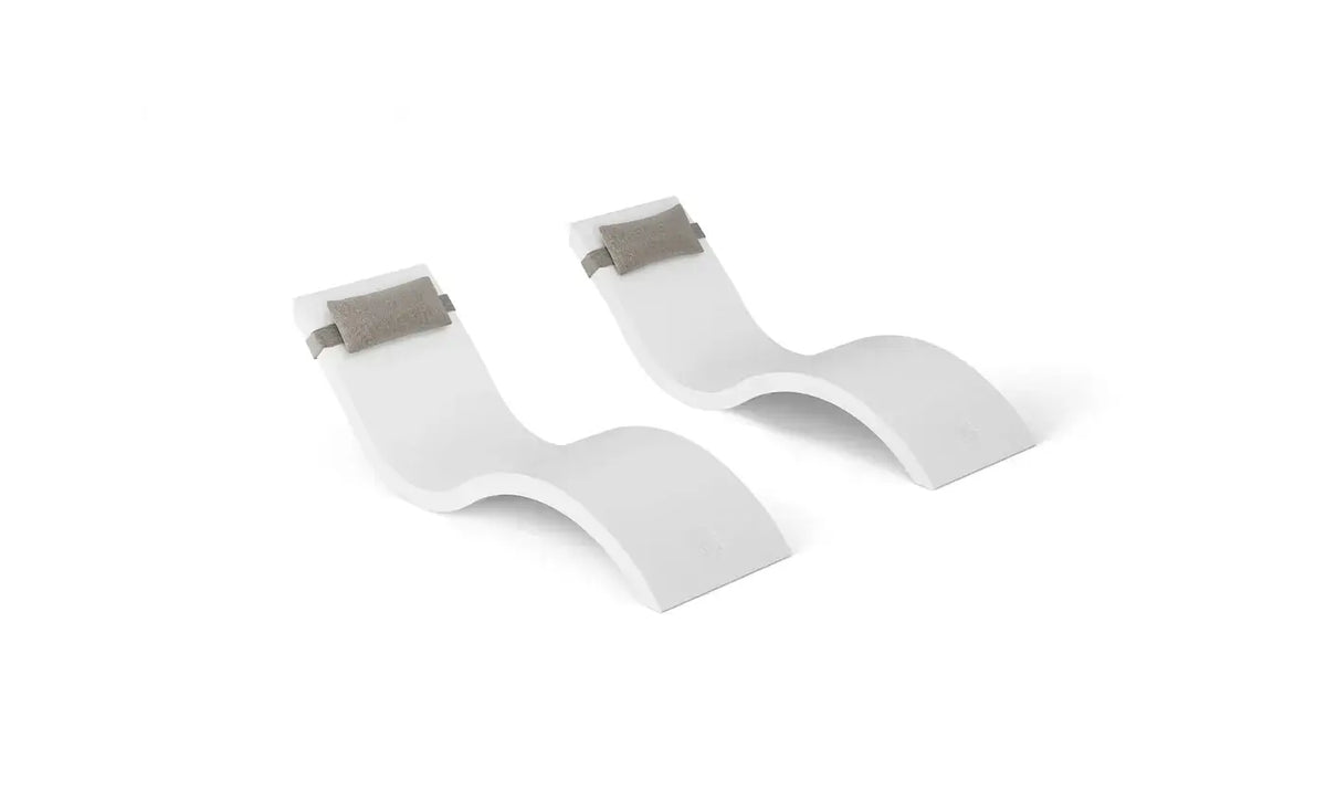 This luxurious set includes two Signature In-Pool Chaise Loungers and two matching Headrest Pillows, designed for ultimate comfort on your pool’s tanning ledge, baja shelf, or sun shelf with water depths of 0-9 inches.
