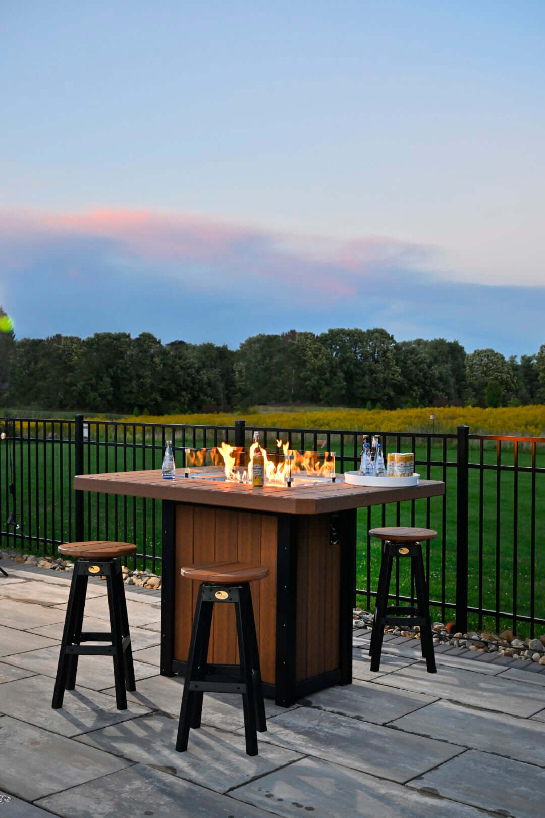 LuxCraft 62" Lumin Rectangular Gas Propane Fire Table Set with Bar Stools in Antique Mahogany and Black configured for outdoor entertaining — fade-...