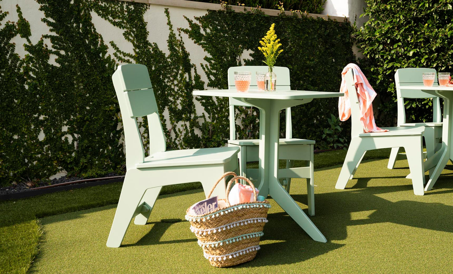 Sage Green Mainstay Dining Side Chairs at an outdoor bistro setting