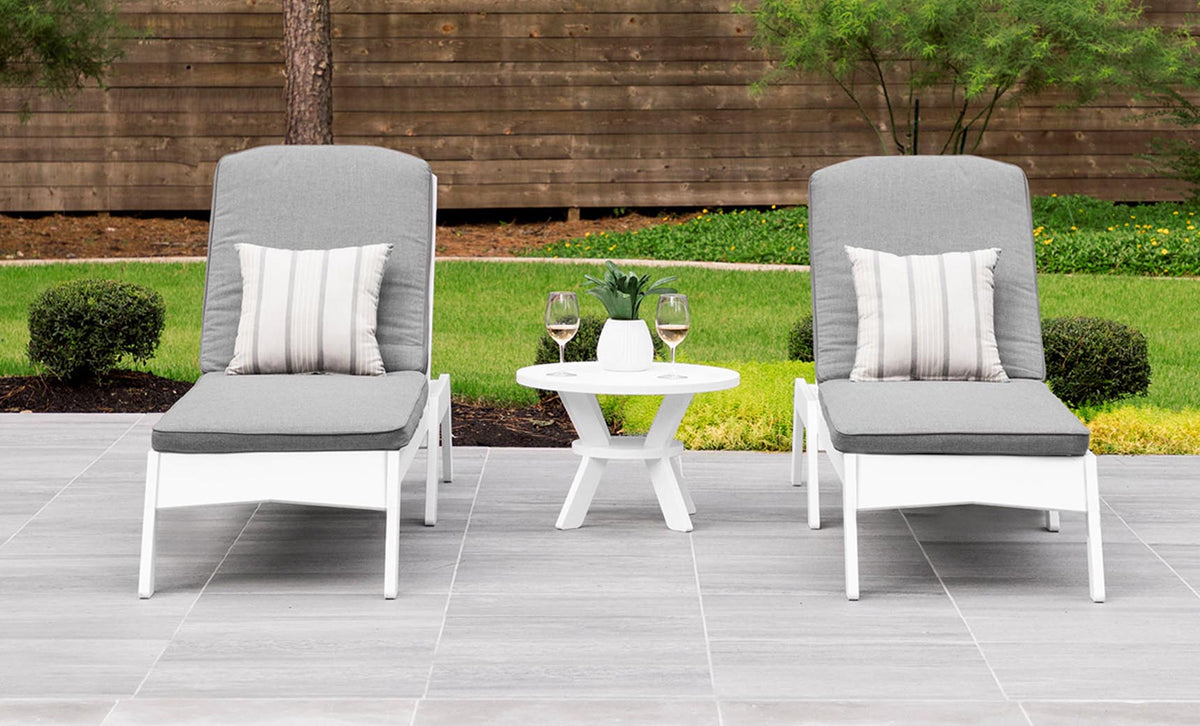 Mainstay Round Side Table between two lounge chairs with drinks