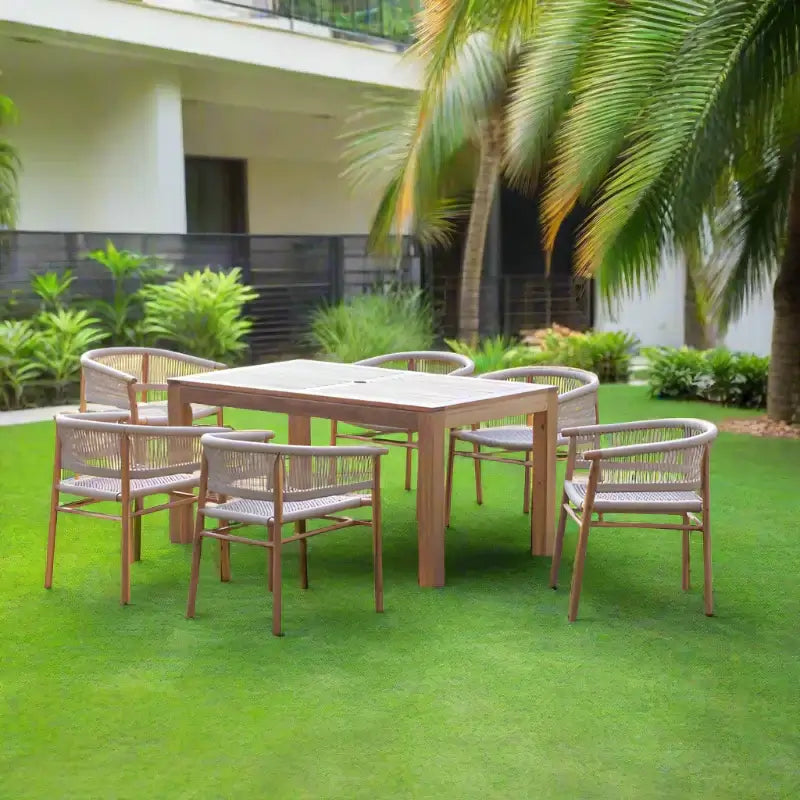 Panama Jack 7-piece rectangular outdoor dining table set made with solid Acacia wood construction and fast drying tan rope