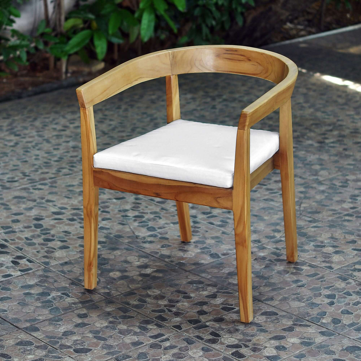 Panama Jack outdoor dining armchair made with Grade-A teak wood for a natural wood finish with cushions