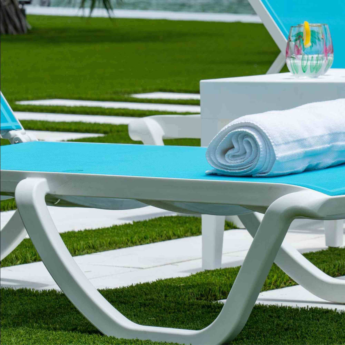 Panama Jack 3-piece outdoor chaise loungers set that are stackable with an adjustable back rest