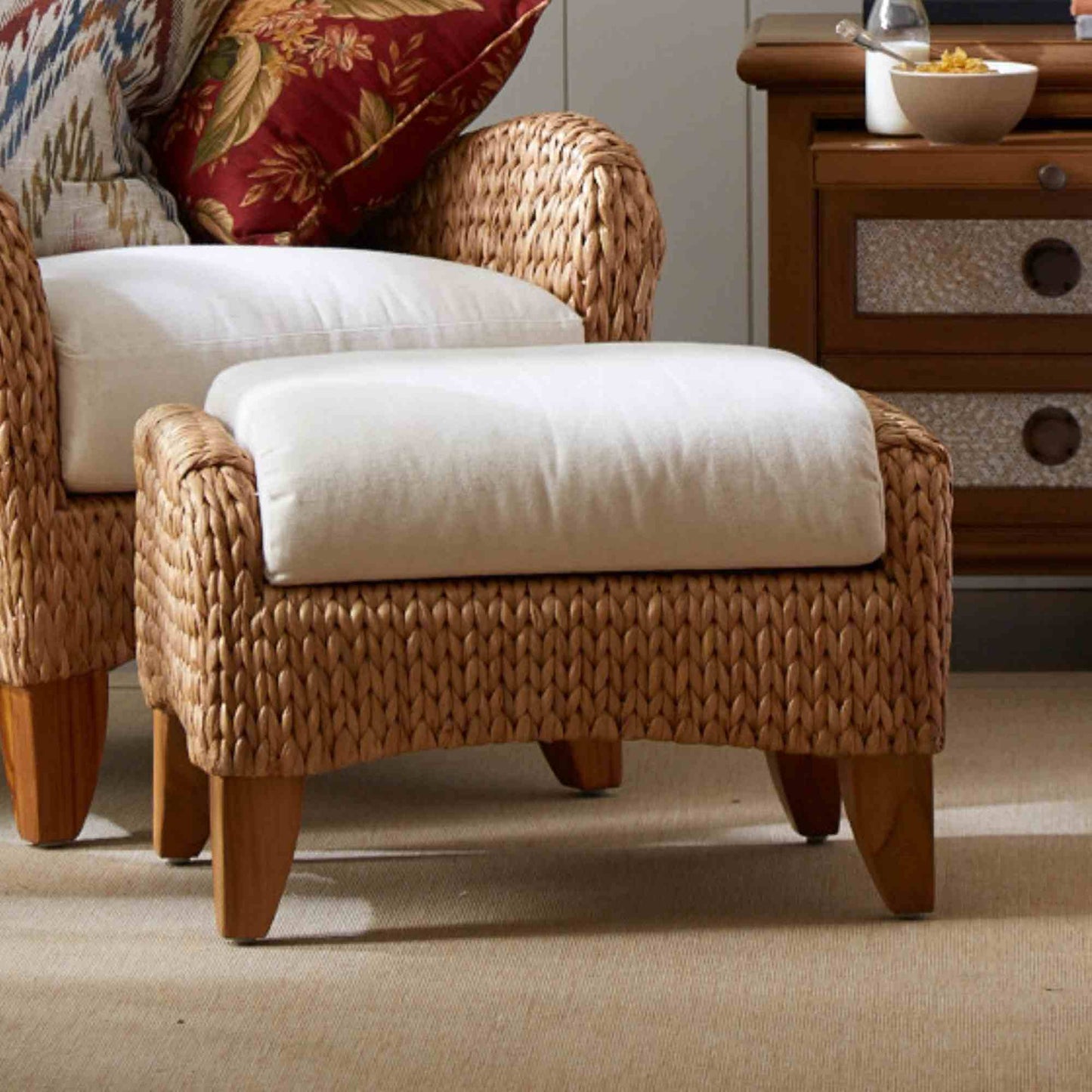 Indoor or sunroom wing chair with ottoman crafted with natural seagrass and durable wooden legs