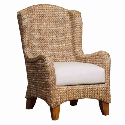 Indoor or sunroom wing chair crafted with natural seagrass and durable wooden legs