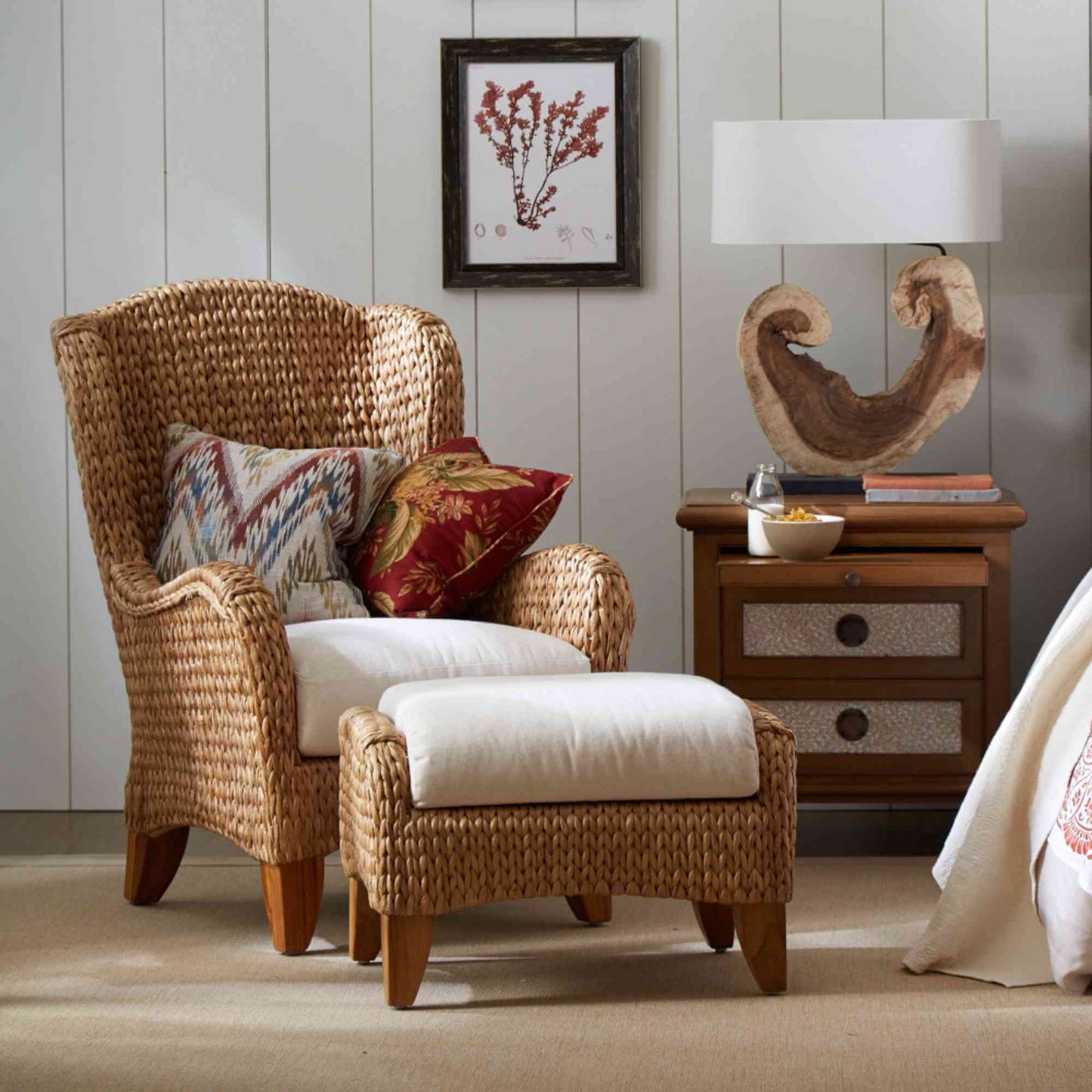 Indoor or sunroom wing chair with ottoman crafted with natural seagrass and durable wooden legs