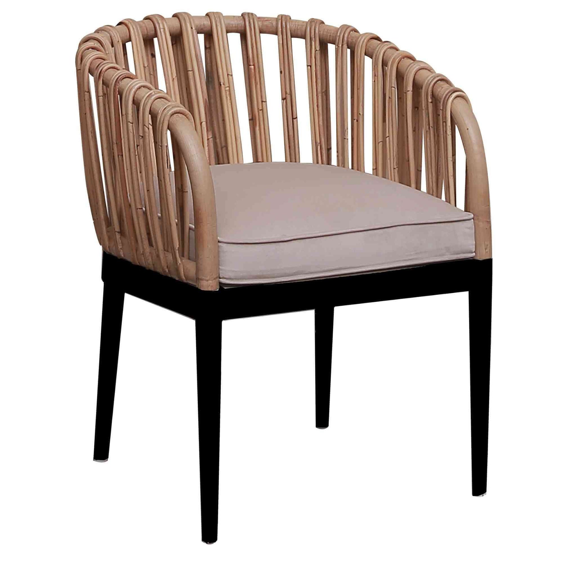 Panama Jack indoor or sunroom dining chair made from black wood frame with natural pencil rattan