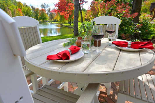 LuxCraft 4' Round Outdoor Dining Table features umbrella hole for added shade and variety of color options