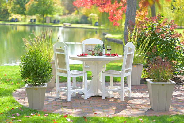 LuxCraft round outdoor dining table 5-piece set includes 1 round dining table and 4 adirondack dining side chairs