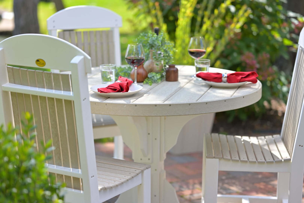 LuxCraft 4' Round Table Set with Adirondack Side Chairs in Birch and White paired for patio lounging — weather-resistant design