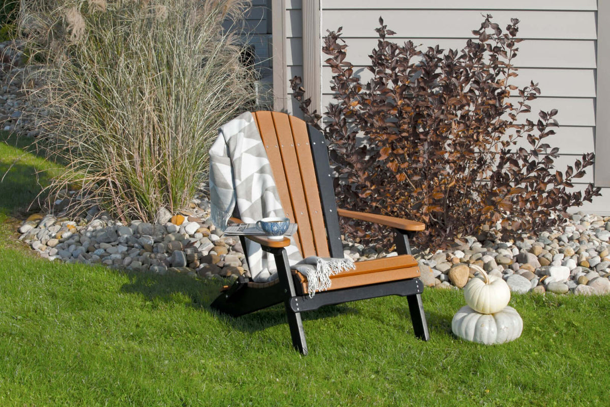 LuxCraft Folding Adirondack Chair in Cedar and Black configured for porch seating — fade-resistant poly